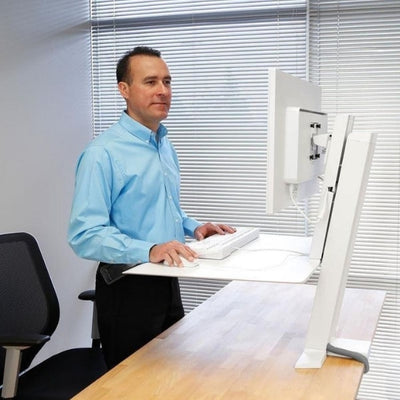 Ergotron WorkFit SR Single Monitor Sit Stand Workstation Side View Standing