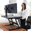 Ergotron WorkFit T Sit Stand Desktop Workstation Back Side View Standing