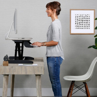 Ergotron WorkFit Z Mini Sit Stand Desktop Side View Standing