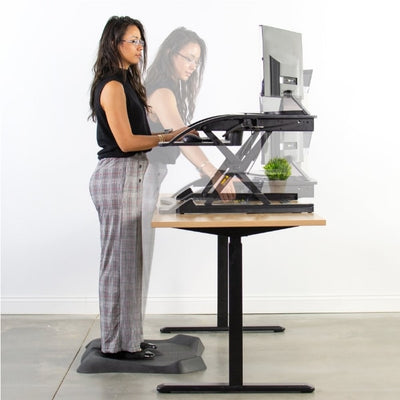 Vivo Desk-V000R 36_ Black Standing Desk Riser In Motion
