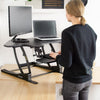Vivo Desk V000VCE 43 Electric Standing Desk Riser  Front Side View Typing